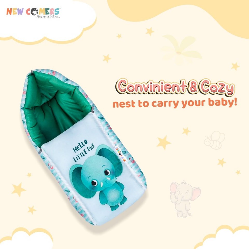 Green colored cartoon cute small elephant saying "Hello Little One" print infant nest for super comfy sleep - newborn sleep pod by newcomers