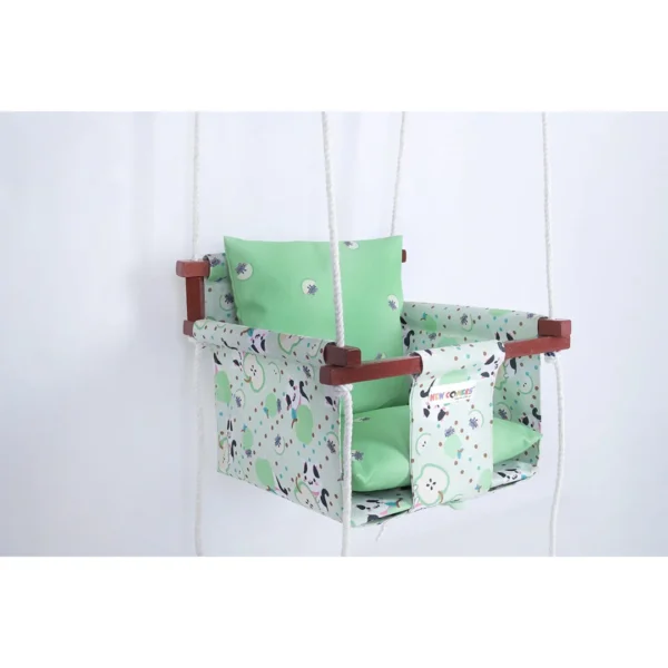 green apple colorful print baby sleeping swing for online baby jhula shopping, with light green colored pillows made by newcomers brand