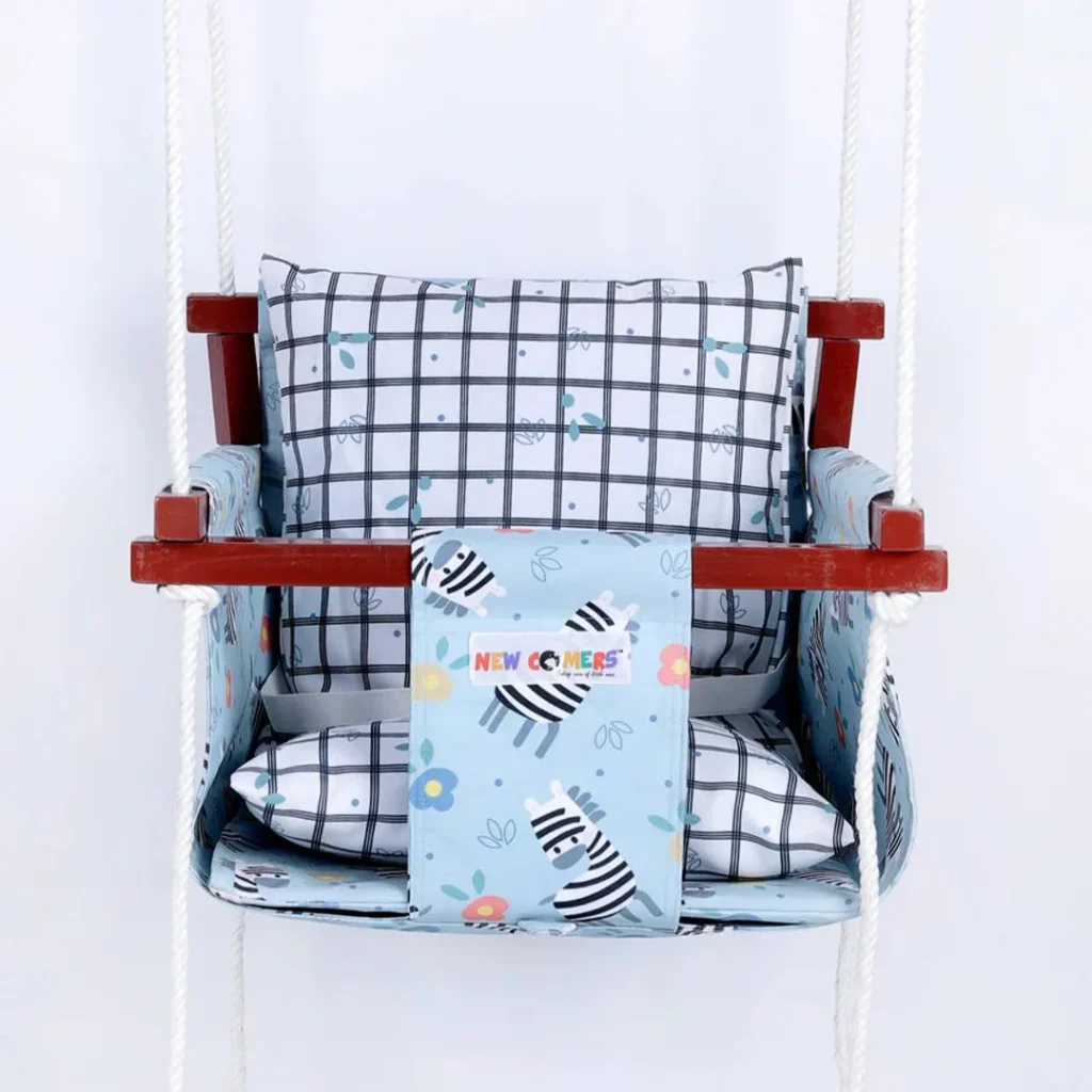 light blue fabric with zebra animal print newborn jhula with wooden frames and ropes and safety belt.