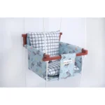 light blue fabric with zebra animal print newborn jhula with wooden frames and ropes and safety belt.