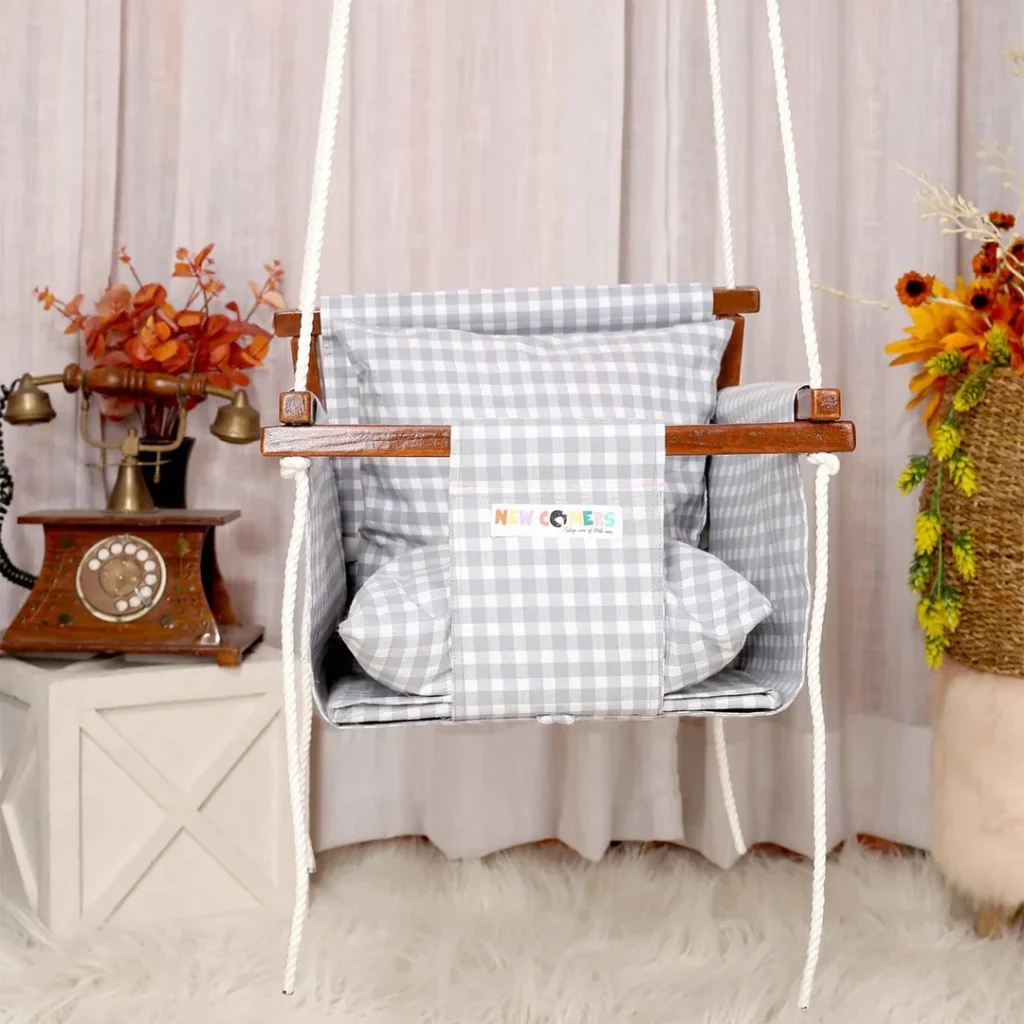 grey and white square checks design adjustable and portable beby jhula with wooden frames and ropes Best swing set for 2-year-old babies