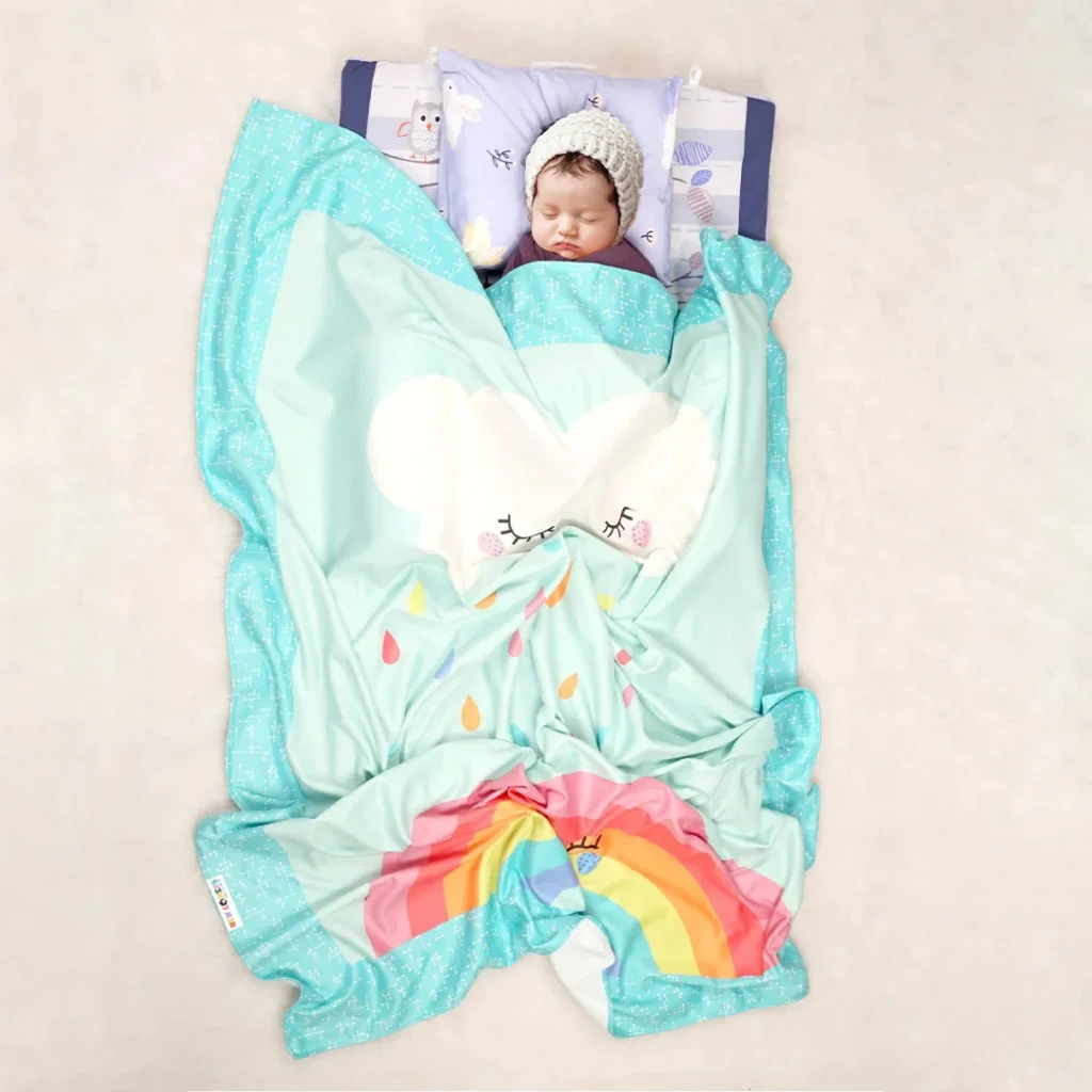 Blue newborn mink blanket set with smiling rainbow and rainy cloud cartoon print and baby sleeping inside daily blanket for newborns by newcomers