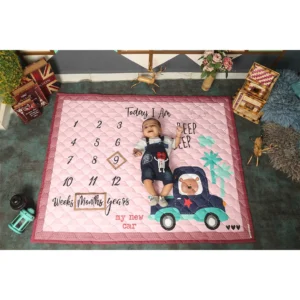 Pink crib blanket set cartoon printed baby milestone blankets with baby sleeping on it saying "Today i am 9 Months old" by newcomers