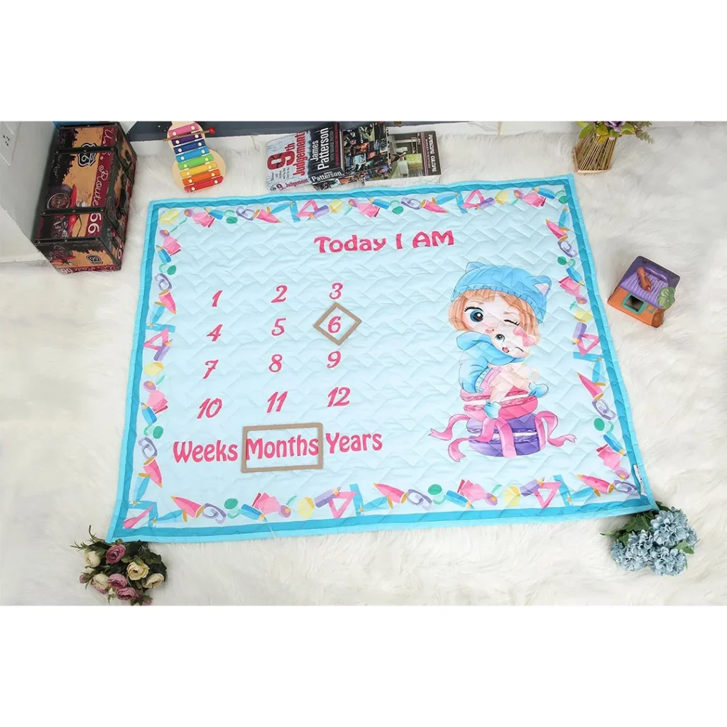 sky blue cartoon prints blanket for newborns with props saying 6 months milestone by newcomers