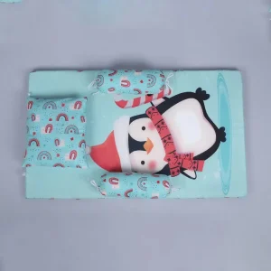 blue color fabric beautiful 3pc bed set for babies with penguin wearing red santa hat with muffler. Bedding set online comes with bed mattress, a pillow and bolster made by newcomers